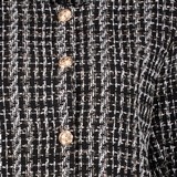 Structuurgeweven dames jas zwart wit