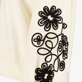 Dames sweater beige met geborduurde bloemen