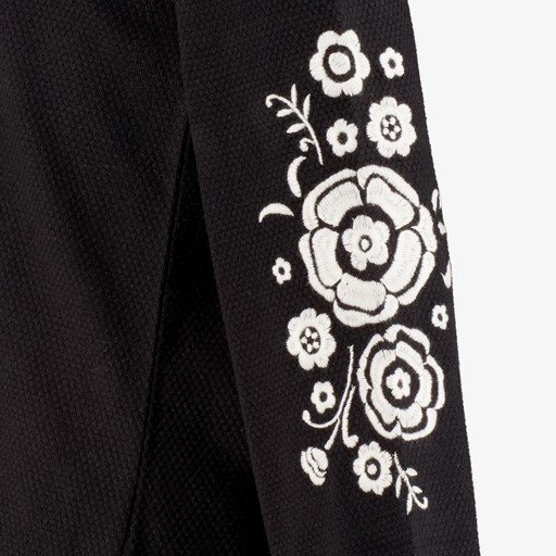 Meisjes shirt geborduurde mouwen zwart