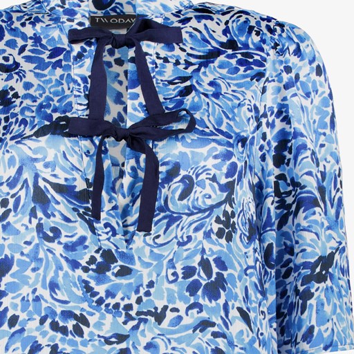 Dames blouse met strikjes blauw