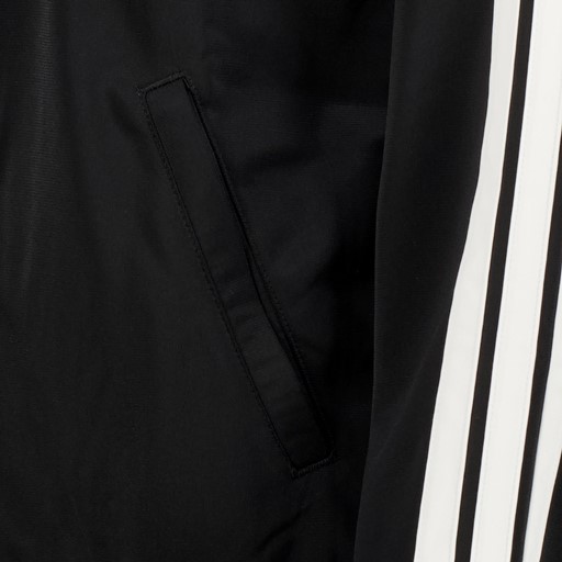 Essentials 3-Stripes dames trainingspak