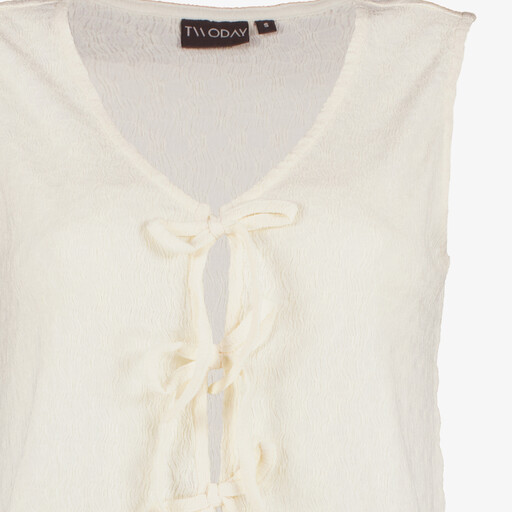 Dames top met strikjes ecru