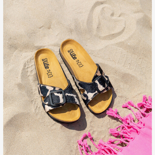 Dames slippers met koeienprint zwart wit