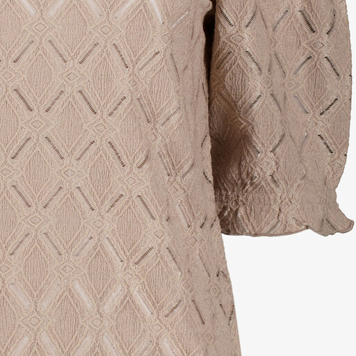 Dames top met structuur zand