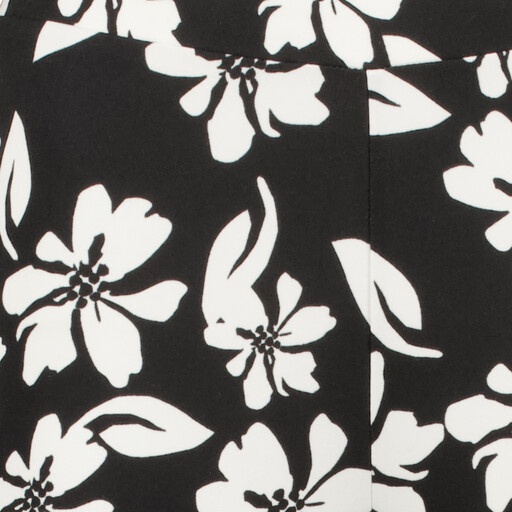 Flared dames broek met bloemenprint zwart wit