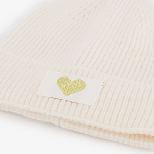 Gebreide meisjes muts met hartje wit