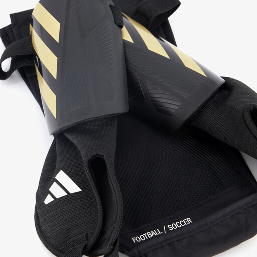 Tiro Match kinder scheenbeschermers zwart goud