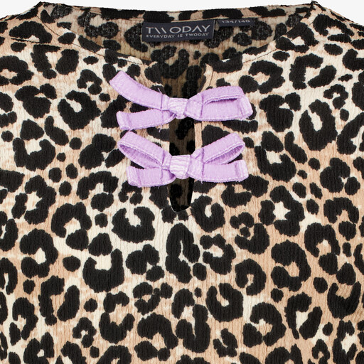 Meisjes top met panterprint en strikjes