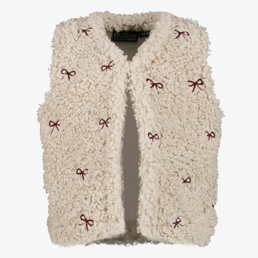 Fluffy meisjes gilet met strikjes beige