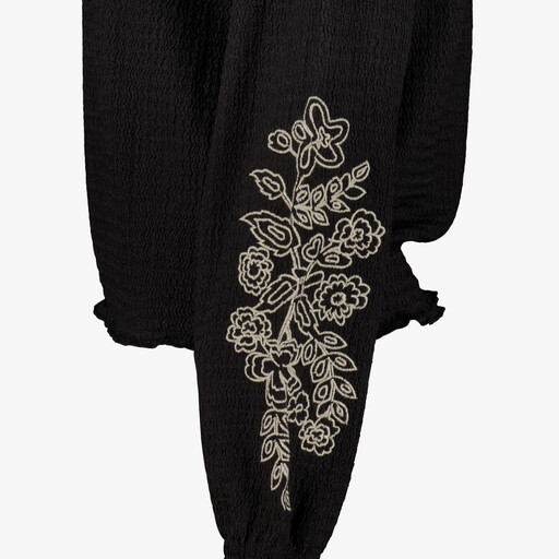 Dames blouse met geboorde bloemen zwart