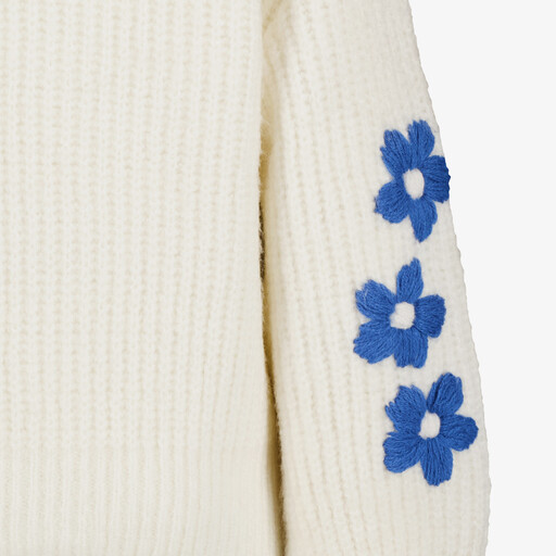 Gebreid meisjes vest wit met blauwe bloemen
