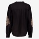 Dames blouse geborduurde details