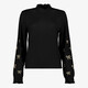 Dames top met col en strikjes zwart