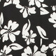 Flared dames broek met bloemenprint zwart wit