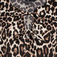 Dames blouse met panterprint en strikjes