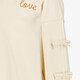 Meisjes sweater met strikjes beige