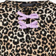 Meisjes top met panterprint en strikjes