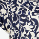 Dames top met bloemenprint blauw wit