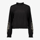 Dames blouse met geboorde bloemen zwart